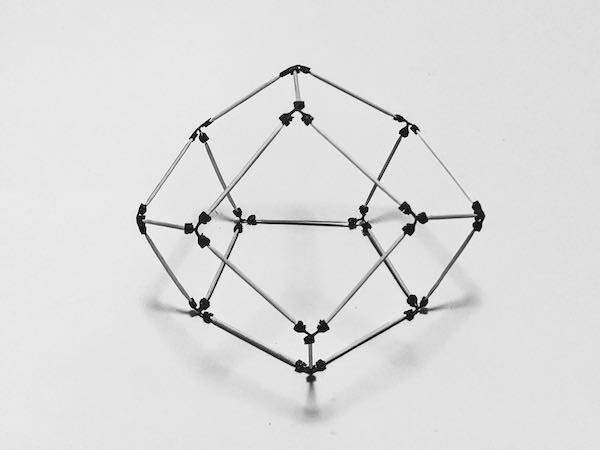 model of a truncated triangular bipyramid made using sparx connectors and toothpicks