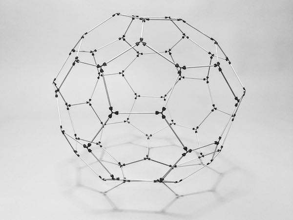 model of a truncated icosahedron or carbon 60 buckminsterfullerene molecule made using sparx connectors and toothpicks