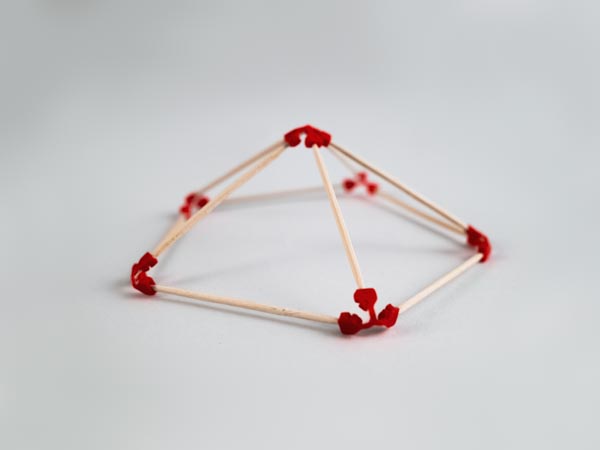 model of a pentagonal pyramid made using sparx connectors and toothpicks