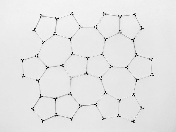 model of heptagon-pentagon tiling made using sparx connectors and toothpicks