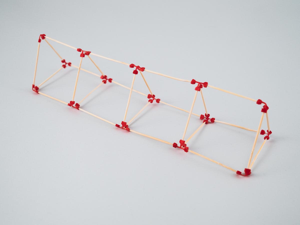 model of a striangular prism stack made using sparx connectors and toothpicks