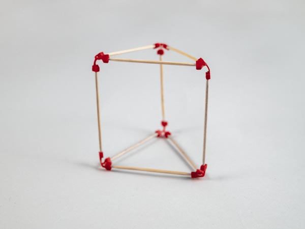 model of a triangular prism made using sparx connectors and toothpicks